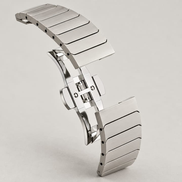 Butterfly clasp close-up: press both side buttons to open the band