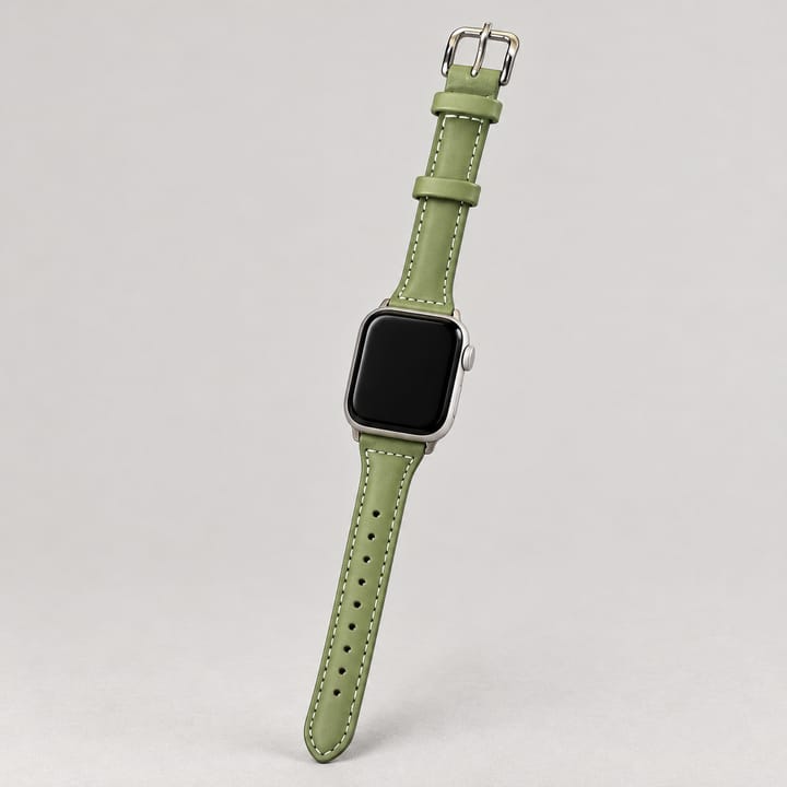 The Ribbon in Olive, held in the hand
