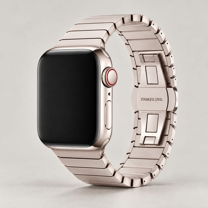 Starlight flat link band on a watch, showing the butterfly clasp