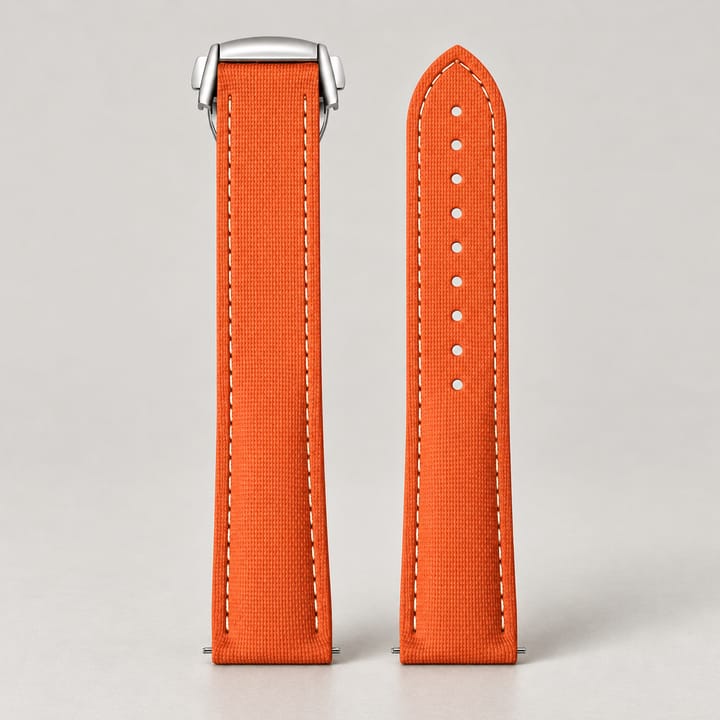 Orange Fathom FKM strap with a white edge line and the silver folding clasp