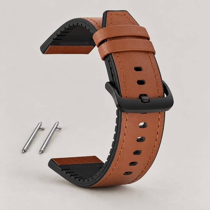 The Bridle in Tan: tan leather with tan stitching on a black rubber backing, matte black buckle, with its quick-release pins shown in the circle