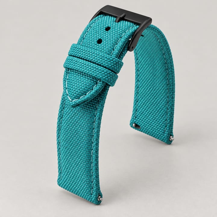 The Jib in Teal/Black: teal sailcloth watch band with a black buckle