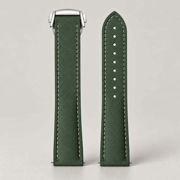 Green Fathom FKM strap with a white edge line and the silver folding clasp