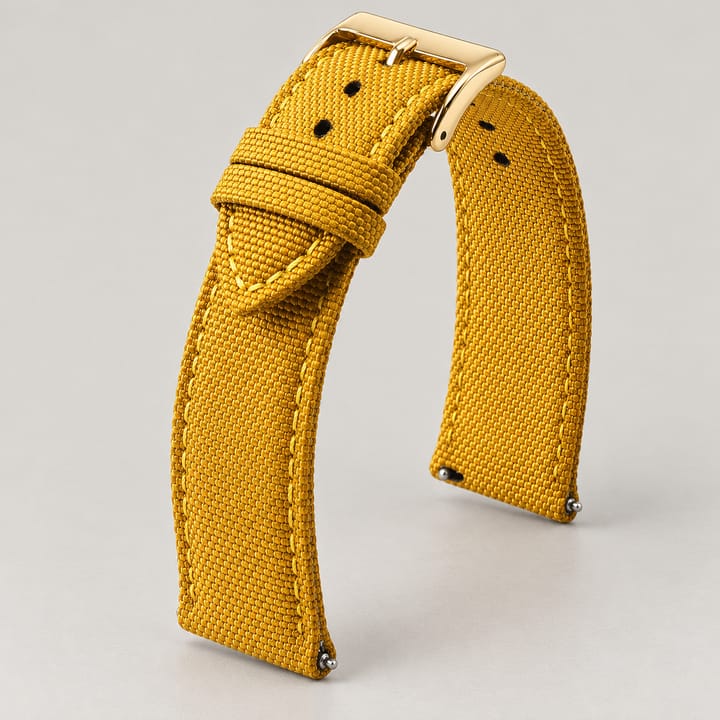 The Jib in Mustard/Gold: mustard sailcloth watch band with a gold-tone buckle