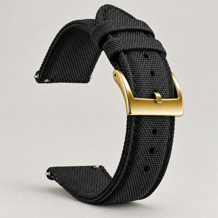 The Halyard woven nylon watch band in black with a gold-tone buckle and quick-release spring bars