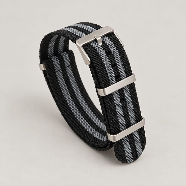 The Parachute Elastic NATO Strap, Black and gray stripe with steel hardware