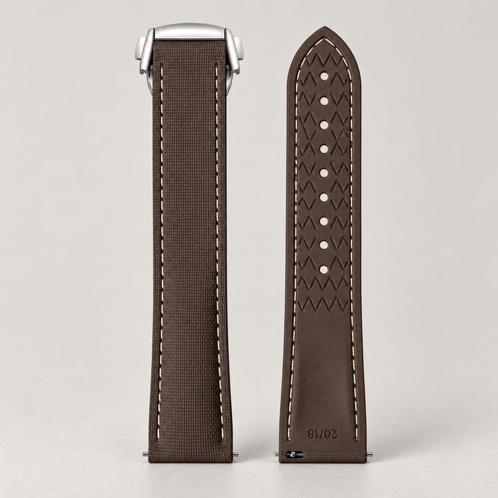 Brown Fathom FKM strap with the silver folding clasp, the long piece showing its zigzag underside