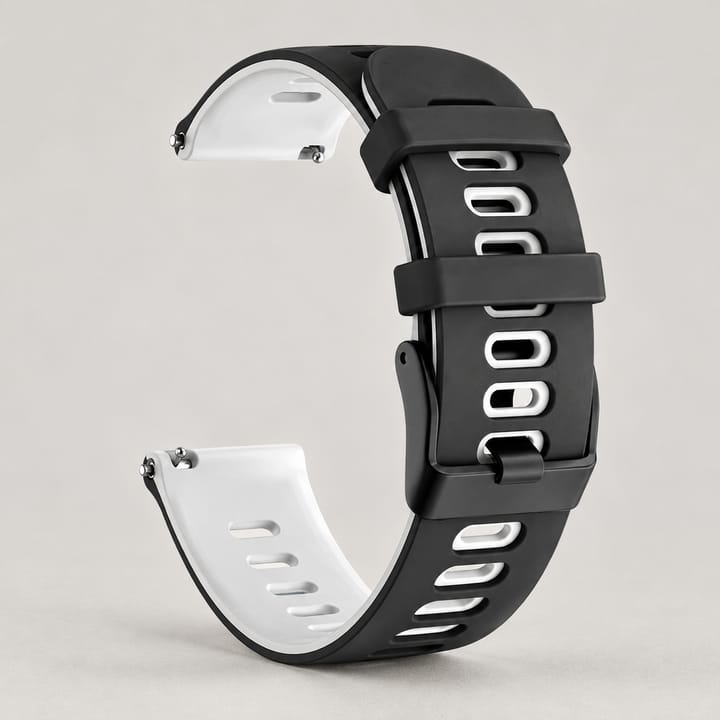 The Tempo in Black/White: black silicone outside, white underneath and around the holes, with a matte black pin buckle