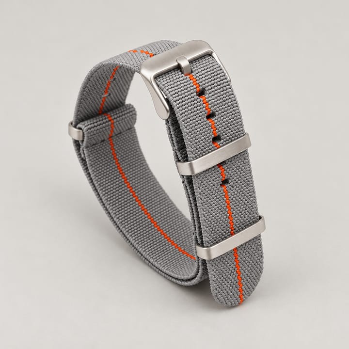 The Parachute Elastic NATO Strap, Light gray with orange stripe and steel hardware