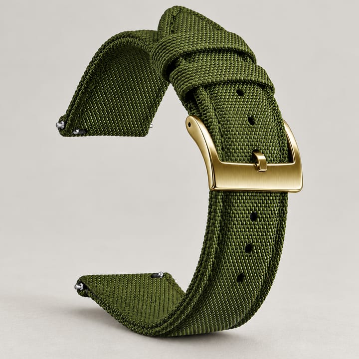 The Halyard woven nylon watch band in olive green with a gold-tone buckle and quick-release spring bars