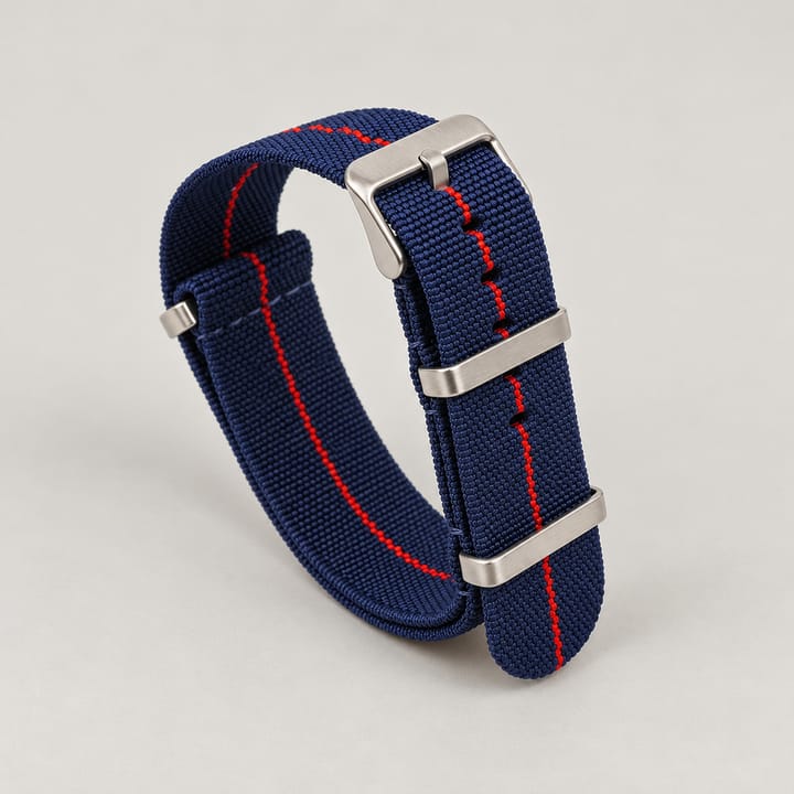 The Parachute Elastic NATO Strap, Navy with red stripe and steel hardware