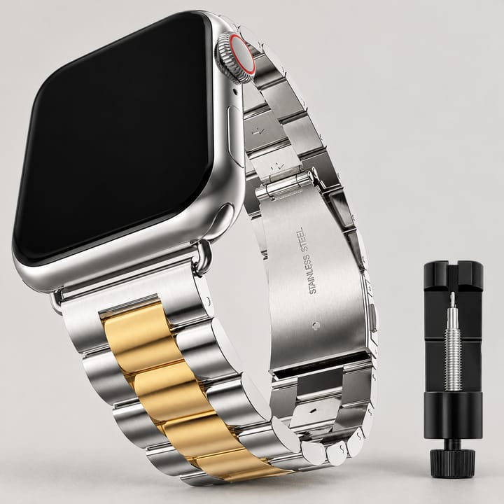 Silver/Gold three-link steel band on a silver watch, with the link pin tool