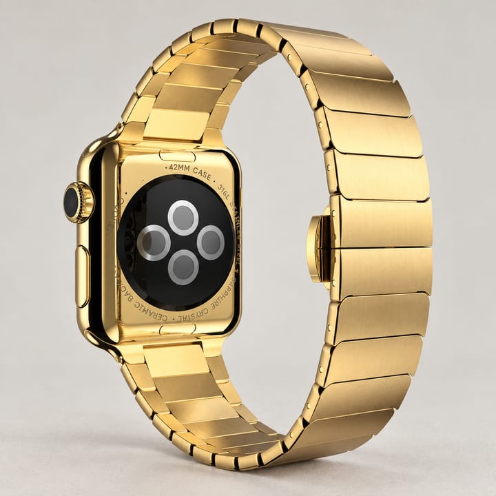 Gold flat link band, seen from the back of the watch