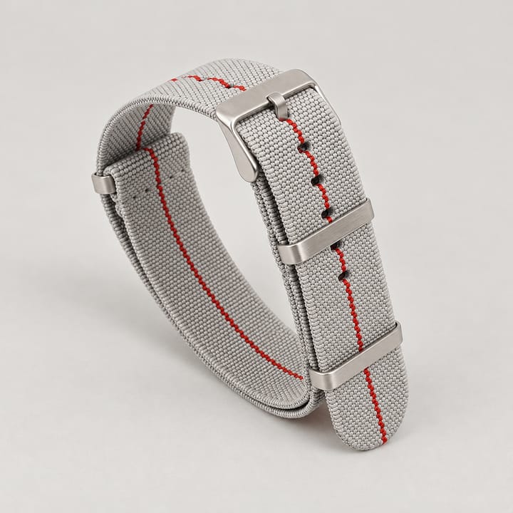 The Parachute Elastic NATO Strap, Gray with red stripe and steel hardware