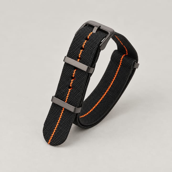 The Parachute Elastic NATO Strap, Black with orange stripe and black hardware