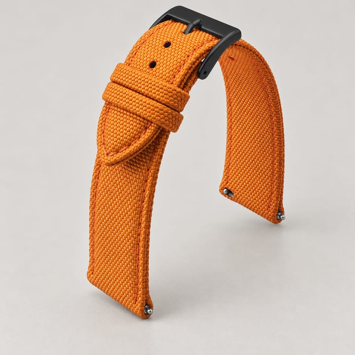 The Jib in Orange/Black: orange sailcloth watch band with a black buckle